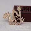 Yiwu hilo dorado color que se conserva chapado en oro DIY Tenglong Tengyun conduciendo niebla tallado tridimensional pieza de flor grande cabeza corona de fénix 168.89