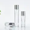 Botella cosmética portátil de rosca a presión Botella de perfume Cilindro fino Botella de vidrio para perfume en stock Tapa plateada Atomizador