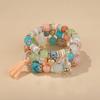 Pulsera multicapa de Torre de Hierro Popular Europea y Americana con Borla de Cristal de Imitación para Mujer, Elegante y Moderna, Juego de Combinación de Pulseras DIY con Cuerda de Cuentas