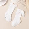 Calcetines de tubo con lazo para bebé con boca de burbuja al por mayor para niños y niñas, calcetines antideslizantes de color sólido al por mayor, fabricantes