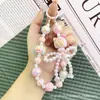Brinquedo Moinho de Vento Desenho Animado Gatinho Corrente de Telefone com Contas Pingente Chaveiro Estojo Portátil para Fones de Ouvido Decoração de Bolsa para Mulheres