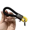 Chaveiro de Metal com Corda Trançada à Mão Criativo Moda Multifuncional Liga de Zinco Pingente de Chaveiro de Carro Fábrica Atacadista