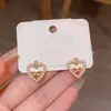 Pendientes de botón vintage estilo francés con lazo y corazón de perla para mujer, lujo ligero, alta gama, pendientes de moda elegantes, al por mayor