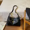 Outono 2026 Nova Bolsa Tote Casual Tendência Grande Capacidade Retrô Alta Aparência Moda Nicho Ombro Único Transversal