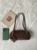 La popular bolsa grande de mujer de este año es el nuevo bolso de hombro cruzado para axila de otoño 2026, un bolso de mano retro de moda para el trabajo