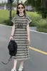 Vestido T-shirt Listrado Estilo Relaxado Manga Longa Curta Feminino 2026 Verão Novo Leve Versátil Solto Emagrecedor Saia