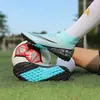 Zapatillas de fútbol de caña alta fábrica al por mayor para hombre y mujer adulto AG púas juvenil clavo roto profesional para partido de fútbol zapatilla deportiva