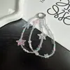 Cadena para teléfono original de cuentas de arroz en forma de estrella de color transparente, colgante de teléfono de cuentas para la muñeca, diseño de nicho, cadena para teléfono de alta gama