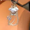 Funda de Teléfono Colgante Cadena Anti-Pérdida Colgante Cámara Ccd Gato Kt Niña Mariposa Cristal Perla Alto Rendimiento Creativo