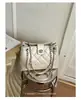 Bolsa de corrente com trama de losangos feminina 2026 novo outono alta qualidade retrô luxo leve para o dia a dia bolsa de ombro única bolsa tiracolo tipo balde