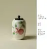 Rinno Gisong Pastel Pintado a Mano Lichi Rojo Mini Lata de Té China Pequeña Cerámica Sellada Lata de Almacenamiento Lata Individual