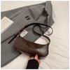 Bolsa de axila retro de lujo ligero de nicho para pedidos extranjeros para mujer 2026 Nueva bolsa de hombro versátil informal Bolso cruzado de moda para el trabajo