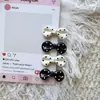 Pinza para el pelo corta de lunares blancos y negros con lazo para niñas pequeñas, accesorio simple para flequillo lateral, tocado versátil y dulce