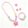 Conjunto de Joias Infantil Quatro Peças Flor Rosa: Colar, Pulseira, Anel, Grampo de Cabelo, Acessórios Doces para Meninas Atacado