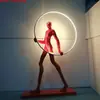 Lámpara de escultura abstracta de bola de personaje Lámpara de sala de exposiciones lámpara de oficina de ventas de hotel Lámpara de decoración artística lámpara de león lámpara de pie con forma humana