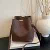 Bolsa Tote Texturizada Modelo Balde Feminina 2026 Verão Nova Tendência Grande Capacidade Moda Versátil para o Dia a Dia Ombro Único Transversal