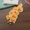 Nueva orquídea phalaenopsis artificial de 8 cabezas, flores decorativas para mesa de casa de huéspedes, ramas de flores artificiales de alta estética para una atmósfera elegante en habitaciones modelo