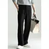 Pantalones Casuales de Lana Lyocell para Hombre con Doble Pinza Cintura Semi-Elástica Otoño 2026 Pierna Ancha Fluida Pierna Recta Adelgazante