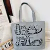 Bolsa Cross-border Bolsa feminina da moda Bolsa de ombro de lona Bolsa casual para todos os gostos Bolsa de ombro simples de lona com estampa de gato Bolsa de microfone