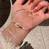 Otoño Nuevo Pulsera de circón de círculo anudado con micro incrustaciones de diamantes completos 2023 moda de personalidad combinable cuerda de mano con cordón