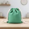Bolsa de cordón de fondo plano bolsa de almacenamiento de joyas personalizada bolsa de cordón en blanco se puede imprimir logo patrón hecho a medida