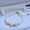 Pulsera de oro de 14 quilates con perlas de agua dulce al vapor de Zhuji, redonda y plana, venta al por mayor, destaca el suministro transfronterizo en vivo.