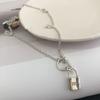 S925 prata esterlina coreano pequena fechadura longa otbuckle puxar ajuste casal em estilo frio colar suéter corrente para homens e mulheres