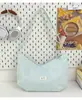 2026 Verano Nueva Moda Elegante Lazo Bordado Romántico Femenino Alto Valor Bandolera Cruzada Bolso Dumpling