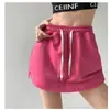 Verano 2025 Nueva Falda Corta Abullonada Estilo Pastel Anti-Exposición de Cintura Alta para Mujeres Petites Blanca