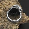 Anillo de titanio para hombre al por mayor joyería europea y americana logo de triángulo vikingo personalidad patrón de cuervo lateral anillo de acero inoxidable