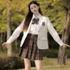 Fábrica en nombre de posventa uniforme jk otoño e invierno traje jk traje abrigo femenino traje jk escuela para traje jk
