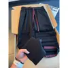 Calça de moletom de corte solto, nova coleção de outono, calça atlética casual preta, malha waffle estilo coreano, versátil para o trabalho e uso diário, calça longa combinando para casais