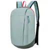 Mochila a color en stock, impermeable, ligera, de gran capacidad para viajes al aire libre, mochila escolar unisex para estudiantes, entrega directa al por mayor