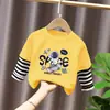 Camiseta base para niño 2026 nuevo modelo camiseta de manga larga a rayas patchwork para niños top de algodón puro otoño para niños mayores