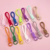 Llavero cordón de cuerda trenzada de nailon para hombres y mujeres hebilla de montañismo cuerda de mano para parejas colgante de bolsa teléfono llave lazo