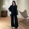 Moda minimalista com designs de nicho, estilo casual, conjunto de tricô preguiçoso, suéter de gola V de outono e calça pantalona conjunto de duas peças para mulheres