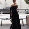 Vestido negro de estilo Hepburn francés al por mayor con hombros descubiertos, lazo y falda grande, temperamento de hermana real de verano para mujer, falda larga