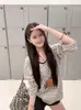 Blusa de Rayas Coreana con Protección Solar Camiseta de Manga Larga para Mujer Ropa de Principios de Otoño 2025 Nueva Holgada Perezosa Relajada Top