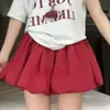 Falda Floral Roja Estilo Coreano para Mujer, Nuevo Verano 2026 de Cintura Alta Versátil Corta Abullonada, Corte Holgado para el Trabajo