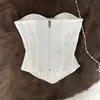 Elegante top de renda patchwork com detalhe de laço, cintura ajustada e efeito emagrecedor, tornando-o uma peça versátil