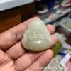 Venta al por mayor de fábrica colgante de Buda Guanyin de jade afgano colgante de jade plano de Buda Guanyin de jade Hetian para el modelo de tienda en vivo suministro