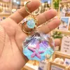 Colgante Acrílico Creativo con Paisaje Marino Relleno de Aceite Llavero, Llavero Botella de Arena Movediza Estrella de Mar, Regalo Pequeño