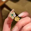 Nuevo Anillo de Flor Doble Estilo Chino con Flor Dorada Cepillada para Mujer, Diseño de Nicho con Sentido de Elegancia y Lujo Ligero, Anillo Versátil