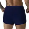 2024 comercio exterior transfronterizo nuevo color sólido costura cintura baja bóxer para hombre shorts de natación para playa cordón en stock al por mayor