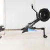 Máquina de Remo Dinâmica com Resistência ao Vento Ounote Pode Ser Distribuída em Nome de Revendedores, e É um Equipamento de Fitness Aeróbico Indoor Silencioso com Resistência ao Vento à Base de Ferro