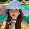Sombrero de Pescador Estilo Coreano 2026 Nuevo para Mujer, Patrón de Cuadros Simple, Sombrero de Sol para Viajes al Aire Libre en el Campo de Primavera y Verano