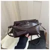 Comercio exterior al por mayor retro simple 2026 casual nuevo de moda para mujer bolso de mano elegante para el trabajo bolso de hombro cruzado