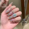 Venta al por mayor de fábrica suministro en vivo material natural peligroso jadeíta azul acuática colgante de azúcar plata s925 incrustada pequeño fresco Joker