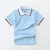 Camiseta de manga corta para niños polo para niños verano pequeño y uniforme de secundaria ropa de jardín algodón blanco azul 100-190