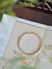 Abanico de flor de junco estilo chino nuevo de plata pura 999 de Fu, pulsera a juego de plata pura, brazalete de plata delicado, suave regalo de estilo nacional para novia